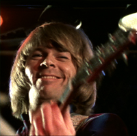 A happy Björn playing guitar on Dancing Queen.